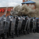 Baltimore police form a perimeter around a CVS pharmacy that was looted and burned during violent protests following the funeral of Freddie Gray April 27, 2015, in Baltimore.
Chip Somodevilla/Getty Images